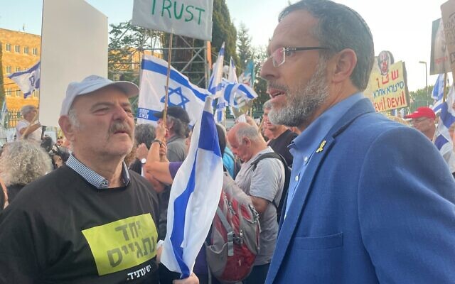 Yesh Atid MK Moshe Tur-Paz attends a rally urging a hostage deal and early elections near the Knesset in Jerusalem, June 17, 2024. (Sam Sokol/Times of Israel) Yesh Atid MK Moshe Tur-Paz attends a rally urging a hostage deal and early elections near the Knesset in Jerusalem, June 17, 2024. (Sam Sokol/Times of Israel)