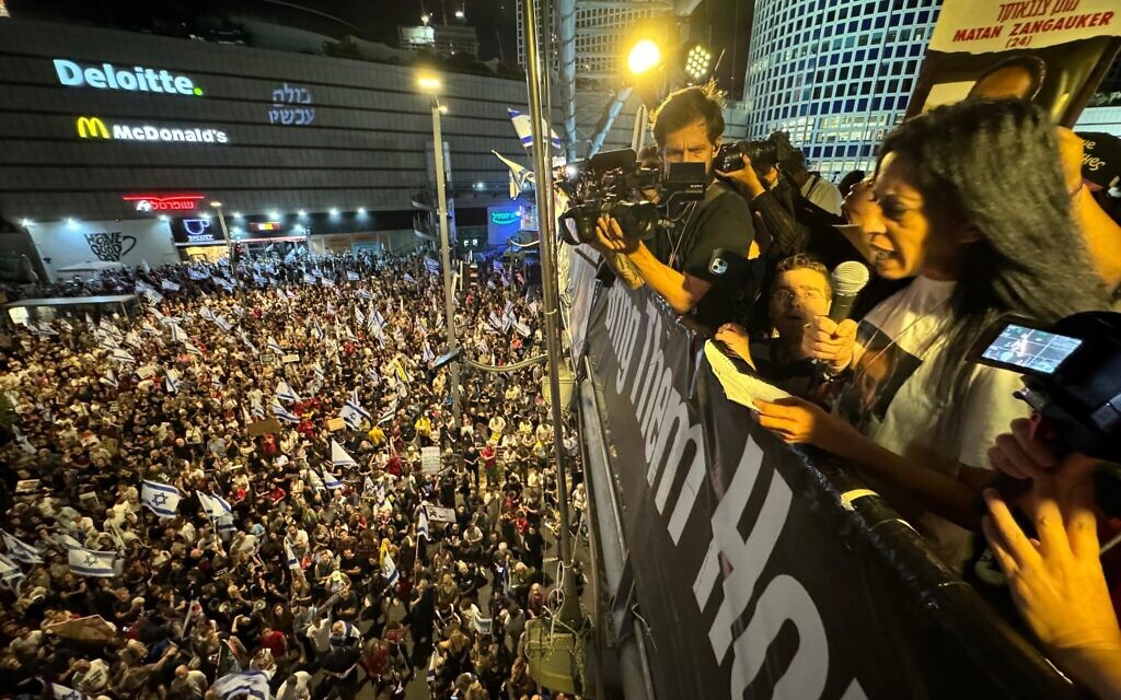 Einav Zangauker, mother of hostage Matan Zangauker, speaks to protesters near the Begin Gate of the Defense Ministry Headquarters in Tel Aviv on June 1, 2024, demanding the government accept the hostage release proposal as laid out by President Joe Biden (Roi Boshi / Pro-Democracy Reform Movement)