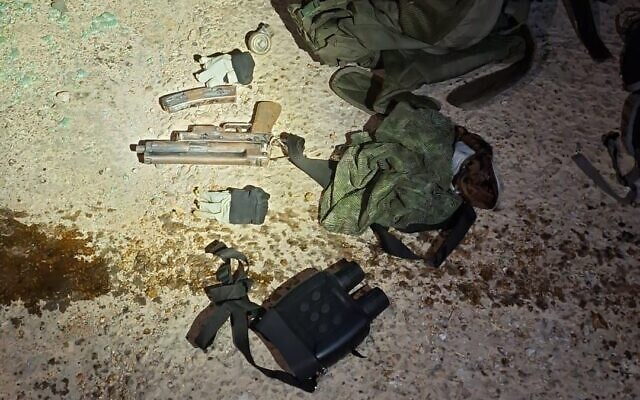 This police handout photo shows a gun that was recovered from a vehicle carrying an alleged terror cell in the West Bank town of Kafr Ni'ma, June 10, 2024. (Israel Police) This police handout photo shows a gun that was recovered from a vehicle carrying an alleged terror cell in the West Bank town of Kafr Ni'ma, June 10, 2024. (Israel Police)