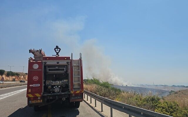 Firefighters battle a blaze in northern Israel sparked by Hezbollah rockets, June 12, 2024. (Fire and Rescue Service) Firefighters battle a blaze in northern Israel sparked by Hezbollah rockets, June 12, 2024. (Fire and Rescue Service)