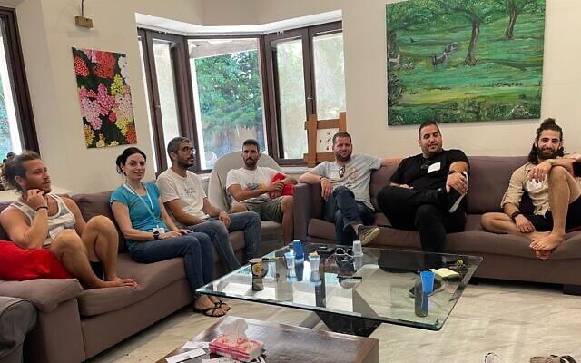 Participants at a one-day intensive PTSD prevention workshop at the Protective Partnership's 'The Villa' program in Herzliya. Protective Partnership CEO Lilach Felner is second from left. June 13, 2024. (Courtesy)