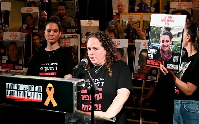 Shani Goren, a former Hamas hostage, speaks in Hostages Square, Tel Aviv, June 22, 2024 (Paulina Partimer / Hostages Families Forum)