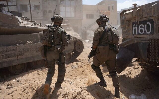 Troops operating in the Gaza Strip in an undated photo released for publication by the military on June 6, 2024. (Israel Defense Forces) Troops operating in the Gaza Strip in an undated photo released for publication by the military on June 6, 2024. (Israel Defense Forces)