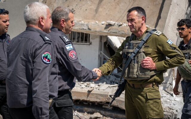 IDF Chief of Staff Lt. Gen. Herzi Halevi (right) meets with Fire and Rescue Service Commissioner Eyal Caspi at the Gibor Camp in Kiryat Shmona, June 4, 2024. (Israel Defense Forces) IDF Chief of Staff Lt. Gen. Herzi Halevi (right) meets with Fire and Rescue Service Commissioner Eyal Caspi at the Gibor Camp in Kiryat Shmona, June 4, 2024. (Israel Defense Forces)