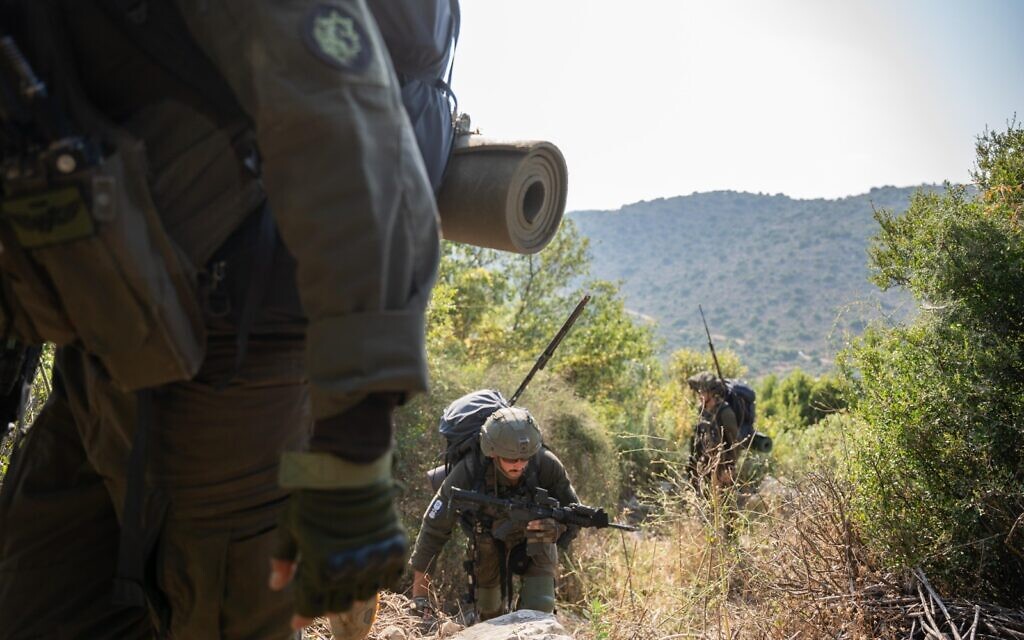 Troops of the 226th Reserve Paratroopers Brigade carry out a drill in northern Israel, in a handout image published by the IDF on June 13, 2024. (Israel Defense Forces)