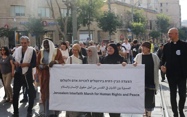 Religious leaders head an interfaith march in support of peace and human rights down Jaffa Street in Jerusalem on June 3, 2024. (Jacob Lazarus/Rabbis for Human Rights) Religious leaders head an interfaith march in support of peace and human rights down Jaffa Street in Jerusalem on June 3, 2024. (Jacob Lazarus/Rabbis for Human Rights)