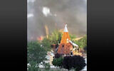 Fires burn after an attack at a synagogue in Derbent, in Russia's Dagestan region, June 23, 2024. Some initial reports say the synagogue and an adjacent church were set on fire. (Screenshot: X, used in accordance with Clause 27a of the Copyright Law)