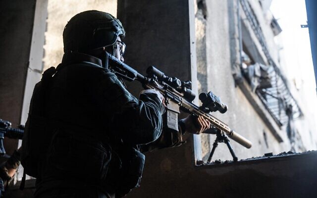 This handout picture released on July 12, 2024 shows an Israeli soldier operating in the Gaza Strip. (Israel Defense Forces)