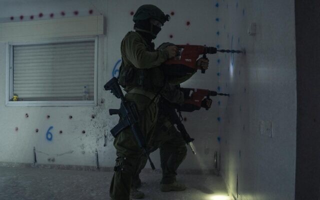 IDF troops prepare to demolish the home of a Palestinian terrorist in the West Bank village of Qalandiya, early July 24, 2024. (Israel Defense Forces)