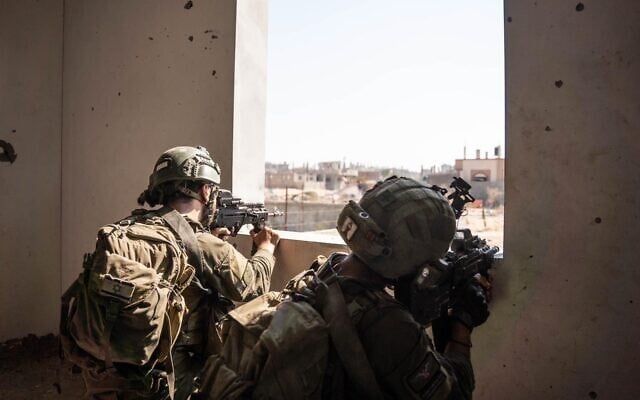 IDF troops seen operating in the Gaza Strip in this handout photo published on July 26, 2024. (Israel Defense Forces)