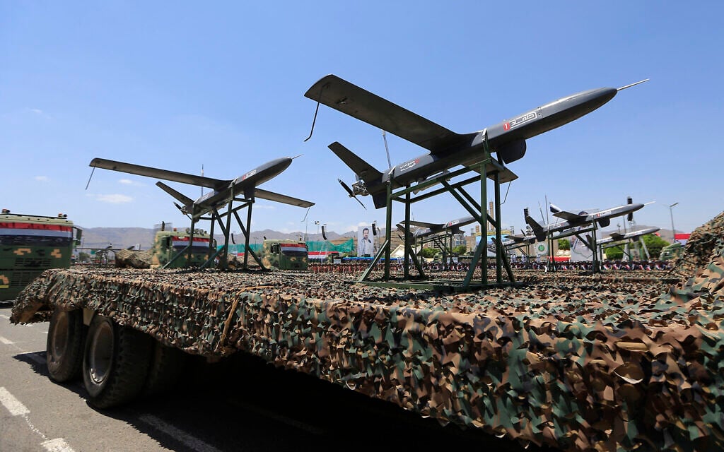 Drones are displayed on the back of a vehicle during an official military parade marking the ninth anniversary of the Houthi takeover of the capital, Sanaa, on September 21, 2023. (Mohammed Huwais/AFP)