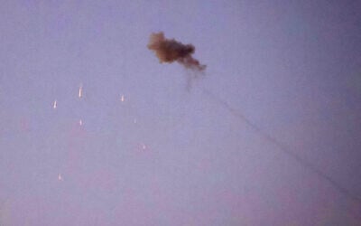 Illustrative: Israel's Iron Dome air defense system intercepts rockets fired by Palestinian terrorists from the Gaza Strip, near Kibbutz Kfar Aza along the Israel-Gaza border, on June 13, 2024. (Jack Guez/AFP)