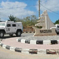 UNIFIL armored vehicles patrol on the entrance of the southern Lebanese town of Naqoura near the border with Israel on June 17, 2024. (Mahmoud Zayyat/AFP)
