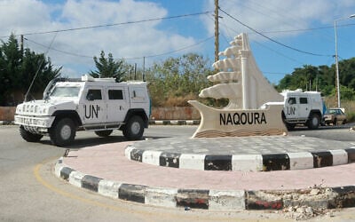 UNIFIL armored vehicles patrol on the entrance of the southern Lebanese town of Naqoura near the border with Israel on June 17, 2024. (Mahmoud Zayyat/AFP)