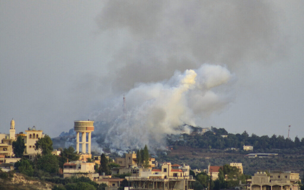 Smoke billows from a site targeted by Israeli shelling in the southern Lebanese village of Dhayra on July 4, 2024. (Kawnat Haju/AFP)