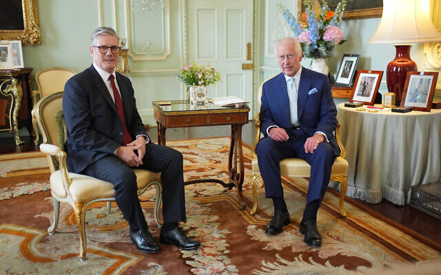 Britain's King Charles III (R) meets with Britain's incoming Prime Minister Keir Starmer during an audience at Buckingham Palace in London on July 5, 2024. (Yui Mok / POOL / AFP) Britain's King Charles III (R) meets with Britain's incoming Prime Minister Keir Starmer during an audience at Buckingham Palace in London on July 5, 2024. (Yui Mok / POOL / AFP)