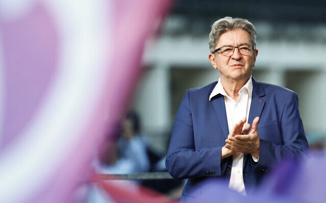 France Unbowed leader Jean-Luc Melenchon applauds during the election night gathering of the of left-wing party following early results in the second round of France's legislative election at La Rotonde Stalingrad in Paris, July 7, 2024. (Sameer Al-Doumy / AFP) France Unbowed leader Jean-Luc Melenchon applauds during the election night gathering of the of left-wing party following early results in the second round of France's legislative election at La Rotonde Stalingrad in Paris, July 7, 2024. (Sameer Al-Doumy / AFP)