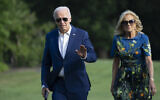 US President Joe Biden and First Lady Jill Biden walk to the White House in Washington, DC, on July 7, 2024, returning from campaign events in Pennsylvania. (Chris Kleponis / AFP)