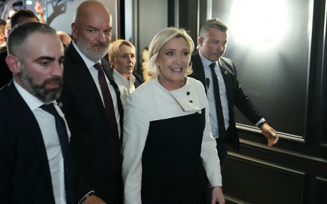 National Rally leader Marine Le Pen arrives for the party's election night party following the early results of the second round of France's legislative election in Paris on July 7, 2024. (Dimitar DILKOFF / AFP) National Rally leader Marine Le Pen arrives for the party's election night party following the early results of the second round of France's legislative election in Paris on July 7, 2024. (Dimitar DILKOFF / AFP)