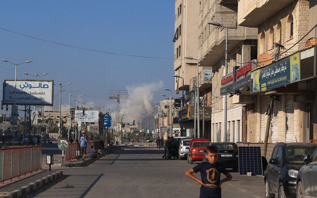 A picture taken from al-Bureij refugee camp in the central Gaza Strip shows smoke billowing after an IDF strike in Wadi Gaza area on July 8, 2024. (Eyad BABA / AFP)