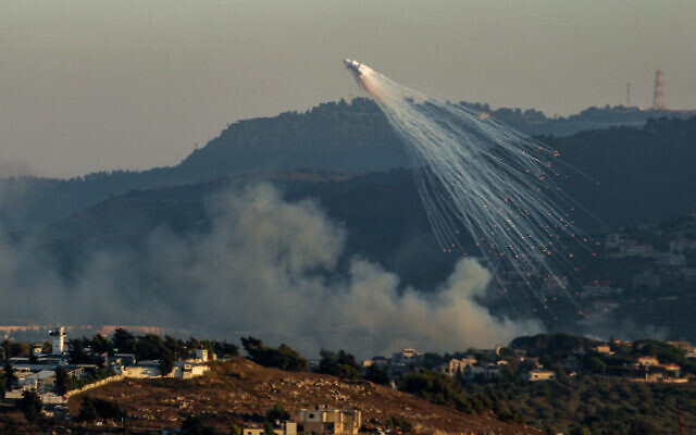 Smoke from Israeli strike billows in Kfarkila in southern Lebanon on July 12, 2024. (Rabih Daher/AFP) Smoke from Israeli strike billows in Kfarkila in southern Lebanon on July 12, 2024. (Rabih Daher/AFP)