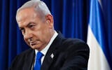 Prime Minister Benjamin Netanyahu addresses a press conference in Tel Aviv on July 13, 2024, during the ongoing war in Gaza between Israel and the Hamas terror group. (Nir Elias / Pool / AFP)