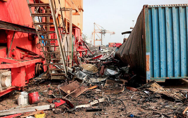 Debris litters a loading dock a day after Israeli strikes on the port of Yemen's Houthi-held city of Hodeida on July 21, 2024. (AFP) Debris litters a loading dock a day after Israeli strikes on the port of Yemen's Houthi-held city of Hodeida on July 21, 2024. (AFP)