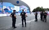 French CRS riot police stand guard outside the Parc des Princes ahead of the men's group C football match between Uzbekistan and Spain, during the Paris 2024 Olympic Games in Paris on July 24, 2024. (Franck Fife/AFP)