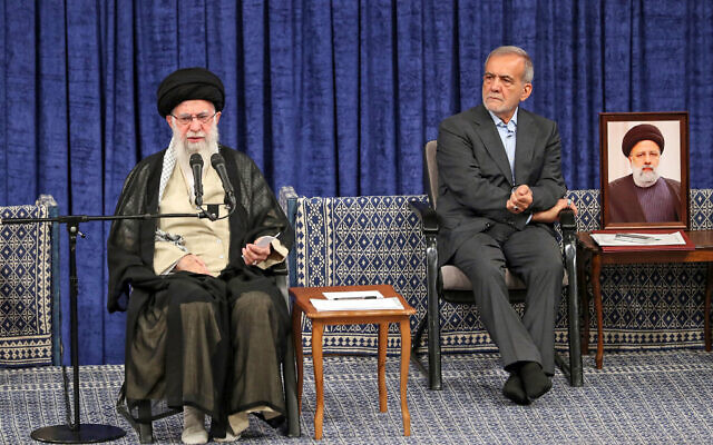 A handout picture provided by the office of Iran's Supreme Leader Ayatollah Ali Khamenei on July 28, 2024, shows him (L) delivering a speech during the official presidential endorsement ceremony of President-elect Masoud Pezeshkian (R). - Iran's supreme leader Ayatollah Ali Khamenei gave his official endorsement of reformist Masoud Pezeshkian as the Islamic Republic's ninth President on July 28, ahead of his swearing-in before parliament on July 30. (Photo by KHAMENEI.IR / AFP) A handout picture provided by the office of Iran's Supreme Leader Ayatollah Ali Khamenei on July 28, 2024, shows him (L) delivering a speech during the official presidential endorsement ceremony of President-elect Masoud Pezeshkian (R). - Iran's supreme leader Ayatollah Ali Khamenei gave his official endorsement of reformist Masoud Pezeshkian as the Islamic Republic's ninth President on July 28, ahead of his swearing-in before parliament on July 30. (Photo by KHAMENEI.IR / AFP)