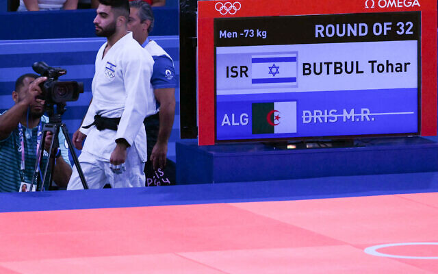 Israel's Tohar Butbul is pictured at the judo men's -73kg round of 32 bout against Algeria's Messaoud Redouane Dris, who disqualified himself from the match, at the Paris 2024 Olympic Games at the Champ-de-Mars Arena, July 29, 2024. (Luis Robayo/AFP) Israel's Tohar Butbul is pictured at the judo men's -73kg round of 32 bout against Algeria's Messaoud Redouane Dris, who disqualified himself from the match, at the Paris 2024 Olympic Games at the Champ-de-Mars Arena, July 29, 2024. (Luis Robayo/AFP)