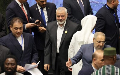 Hamas political leader Ismail Haniyeh arrives in Tehran for the inauguration of the new Iranian president at the parliament in Tehran, hours before being assassinated, July 30, 2024. (AFP)