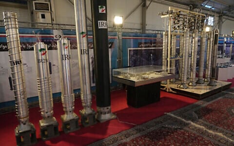 Iran's domestically built centrifuges are displayed in an exhibition of the country's nuclear achievements, in Tehran, Iran, February 8, 2023. (AP Photo/Vahid Salemi)