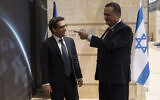 Foreign Minister Israel Katz, right, talks to his French counterpart Stephane Sejourne before a meeting in Jerusalem, April 30, 2024. (AP Photo/Leo Correa)