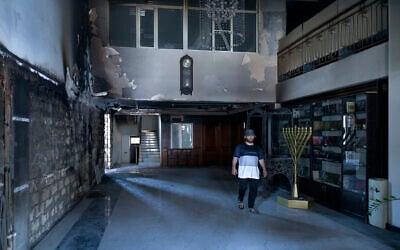 Illustrative A man walks in the damaged Kele-Numaz synagogue in Derbent, Russia, on Tuesday, June 25, 2024.   (AP Photo)