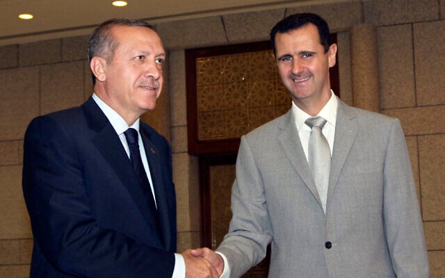 Syrian President Bashar Assad, right, shakes hands with Turkish Prime Minister Recep Tayyip Erdogan, left, at al-Shaab presidential palace in Damascus, Syria, October 11, 2010. (AP Photo/Bassem Tellawi, File) Syrian President Bashar Assad, right, shakes hands with Turkish Prime Minister Recep Tayyip Erdogan, left, at al-Shaab presidential palace in Damascus, Syria, October 11, 2010. (AP Photo/Bassem Tellawi, File)