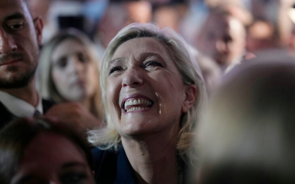 French far right leader Marine Le Pen reacts as she meets supporters and journalists after the release of projections based on the actual vote count in select constituencies , Sunday, June 30, 2024 in Henin-Beaumont, northern France. (AP Photo/Thibault Camus) French far right leader Marine Le Pen reacts as she meets supporters and journalists after the release of projections based on the actual vote count in select constituencies , Sunday, June 30, 2024 in Henin-Beaumont, northern France. (AP Photo/Thibault Camus)