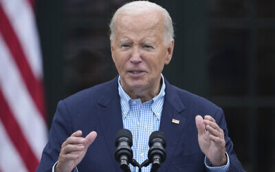 President Joe Biden speaks to active-duty military service members and their families during a Fourth of July celebration and barbecue on the South Lawn of the White House in Washington, Thursday, July 4, 2024. (AP/Susan Walsh)