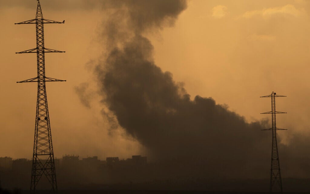 Smoke rises to the sky after an explosion in the Gaza Strip, as seen from southern Israel, July 8, 2024. (AP Photo/Leo Correa)