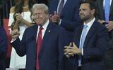 Republican US presidential candidate former president Donald Trump, left, and Republican vice presidential candidate Senator JD Vance appear during the Republican National Convention, July 15, 2024, in Milwaukee. (AP Photo/Matt Rourke)