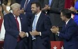 Republican US presidential candidate former president Donald Trump, left, shakes hands with Republican vice presidential candidate Senator JD Vance during the Republican National Convention, July 15, 2024, in Milwaukee. (AP Photo/Matt Rourke)
