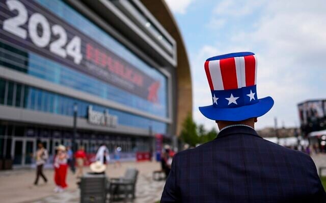 Minnesota delegate Aaron Eberhart walks during the second day of the 2024 Republican National Convention outside the Fiserv Forum, Tuesday, July 16, 2024, in Milwaukee. (AP Photo/Jae C. Hong) Minnesota delegate Aaron Eberhart walks during the second day of the 2024 Republican National Convention outside the Fiserv Forum, Tuesday, July 16, 2024, in Milwaukee. (AP Photo/Jae C. Hong)
