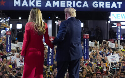 Republican presidential candidate former president Donald Trump stands on stage with former first lady Melania Trump during the final day of the Republican National Convention at the Fiserv Forum, July 18, 2024, in Milwaukee. (AP Photo/Evan Vucci)