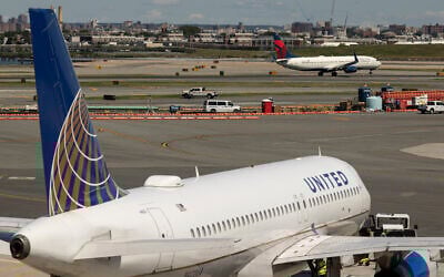 Illustrative: Delta Airlines aircraft takes off as United Airlines aircraft sits on the tarmac at LaGuardia Airport in New York, July 19, 2024. (AP Photo/Yuki Iwamura)