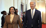 US Vice President Kamala Harris, left, and US President Joe Biden arrive for an event in the East Room of the White House, in Washington, May 9, 2024. (Evan Vucci/AP)