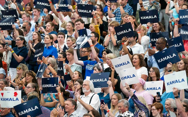 Supports hold up signs backing US Vice President Kamala Harris as she campaigns for resident as the presumptive Democratic candidate during an event at West Allis Central High School, July 23, 2024, in West Allis, Wisconsin. (Kayla Wolf/Ap) Supports hold up signs backing US Vice President Kamala Harris as she campaigns for resident as the presumptive Democratic candidate during an event at West Allis Central High School, July 23, 2024, in West Allis, Wisconsin. (Kayla Wolf/Ap)