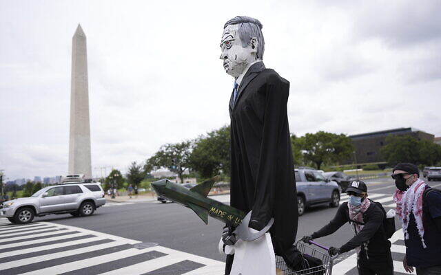 A large effigy of Prime Minister Benjamin Netanyahu is seen as protestors walk the streets, Wednesday, July 24, 2024, in Washington, ahead of a scheduled visit by Netanyahu at the US Capitol.  (AP Photo/Mike Stewart)