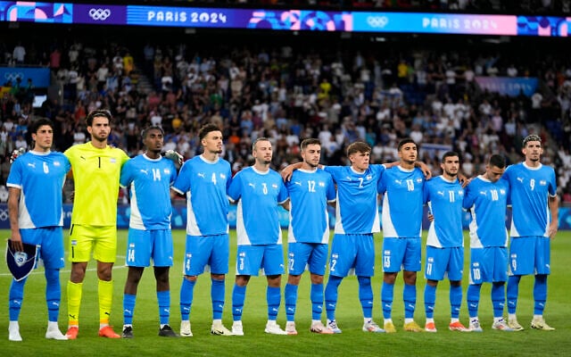 Israel stand for the national anthem during the men's group D match between Israel and Mali at the Parc des Princes during the 2024 Summer Olympics, July 24, 2024, in Paris, France. (AP/Rebecca Blackwell)