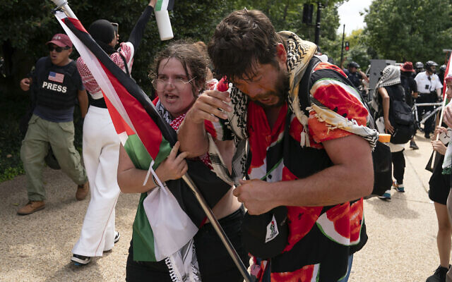 Demonstrators react after being exposed to a chemical irritant as they protest the visit of Prime Minister Benjamin Netanyahu on Capitol Hill, Wednesday, July 24, 2024, in Washington. (AP/Jose Luis Magana) Demonstrators react after being exposed to a chemical irritant as they protest the visit of Prime Minister Benjamin Netanyahu on Capitol Hill, Wednesday, July 24, 2024, in Washington. (AP/Jose Luis Magana)