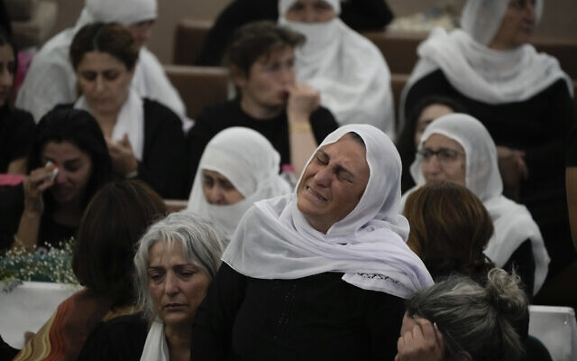 Druze women mourn near the coffins of loved ones after a Hezbollah rocket strike on a soccer field that killed 12 children in Majdal Shams on July 28, 2024 (AP Photo/Leo Correa) Druze women mourn near the coffins of loved ones after a Hezbollah rocket strike on a soccer field that killed 12 children in Majdal Shams on July 28, 2024 (AP Photo/Leo Correa)