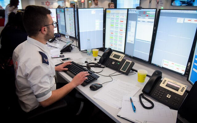 Illustrative— Magen David Adom workers seen at special emergency call center in Ramat Gan, February 23, 2020. (Avshalom Sassoni/Flash90) Illustrative— Magen David Adom workers seen at special emergency call center in Ramat Gan, February 23, 2020. (Avshalom Sassoni/Flash90)